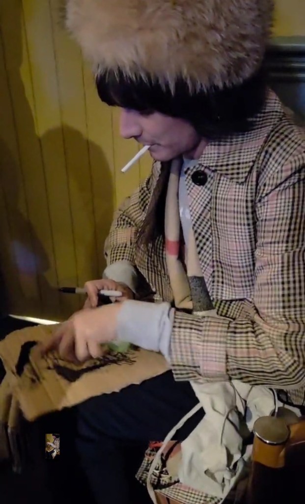 Max Bianco sketching at The Fine Line Project Mind Cambridge Benefit